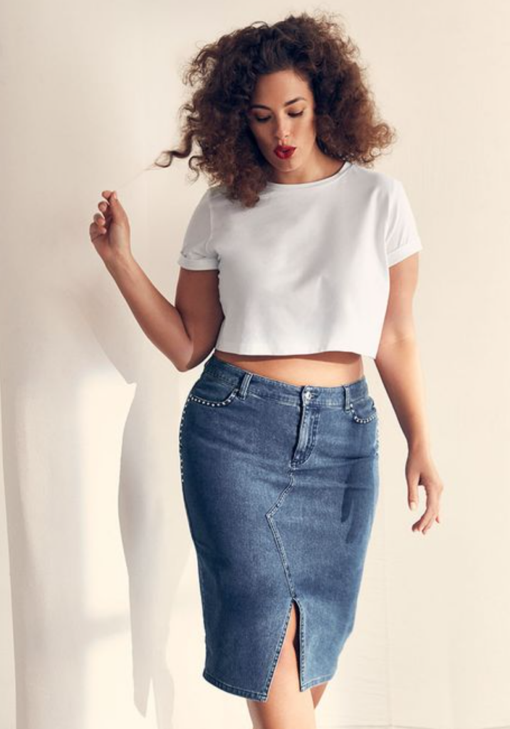 cropped white tee styled with denim skirt